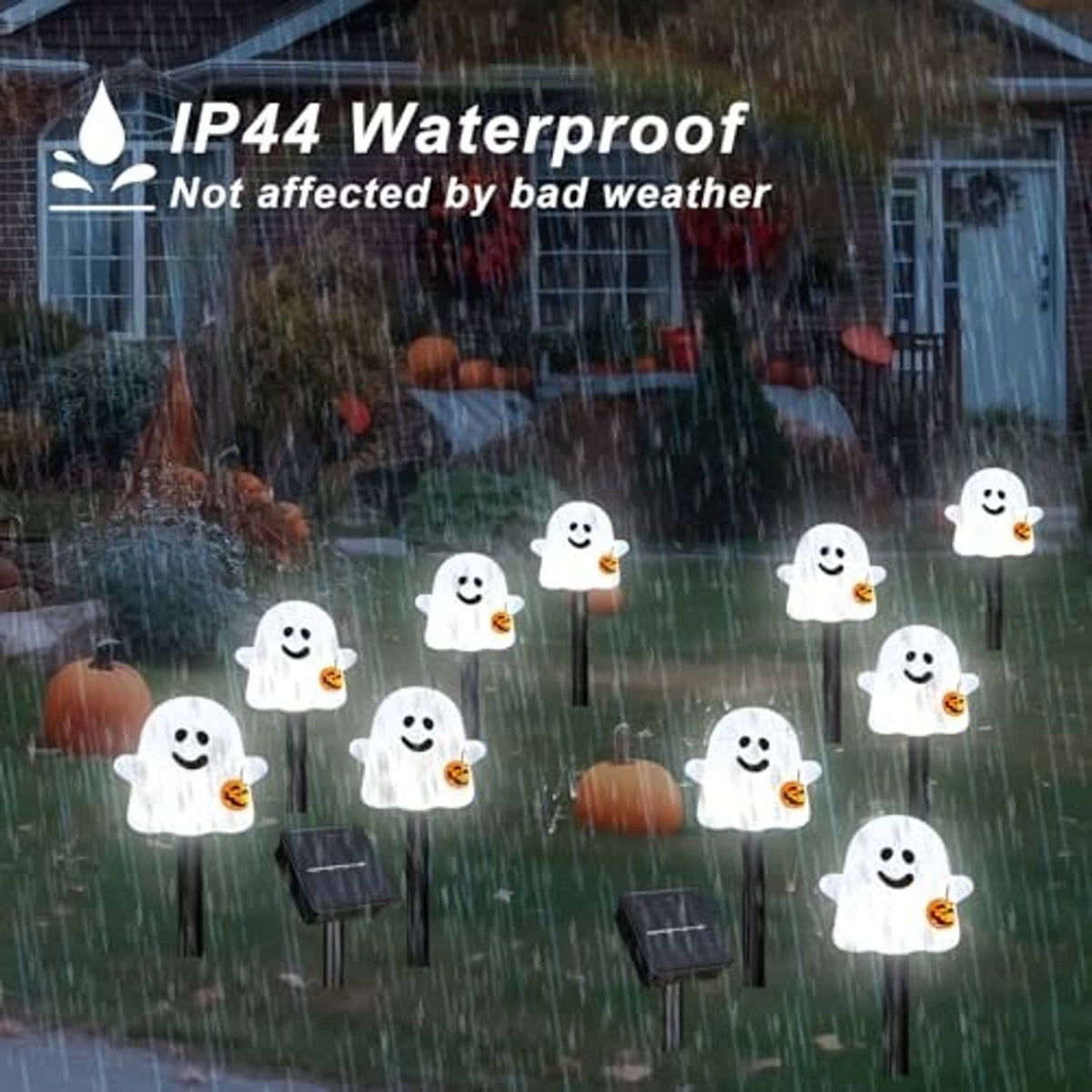 White ghost solar pathway lights with jack-o'-lantern buckets on stakes for wet weather