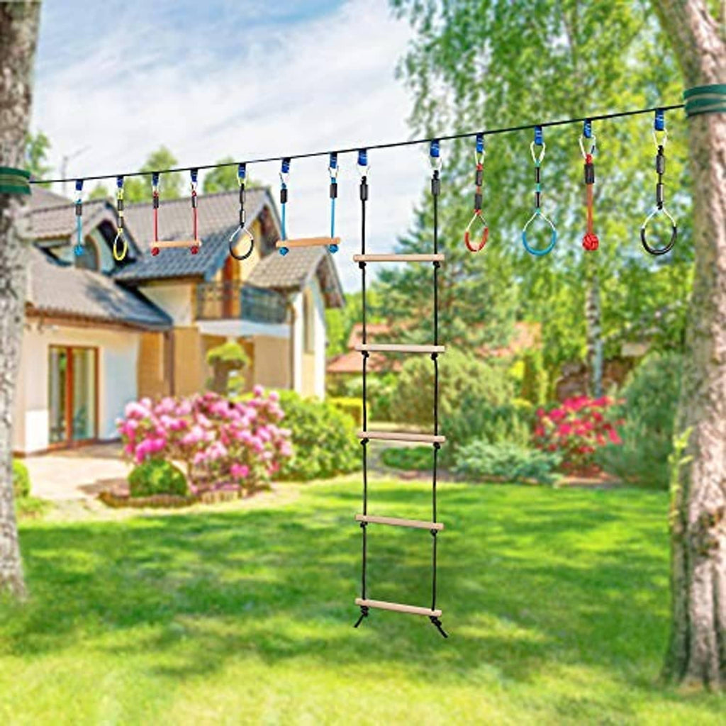 Rope ladder swing with wooden rungs and black ropes, hanging carabiner rings outdoors