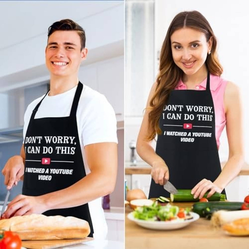 Black cooking apron with “Don't worry, I can do this” slogan on two people