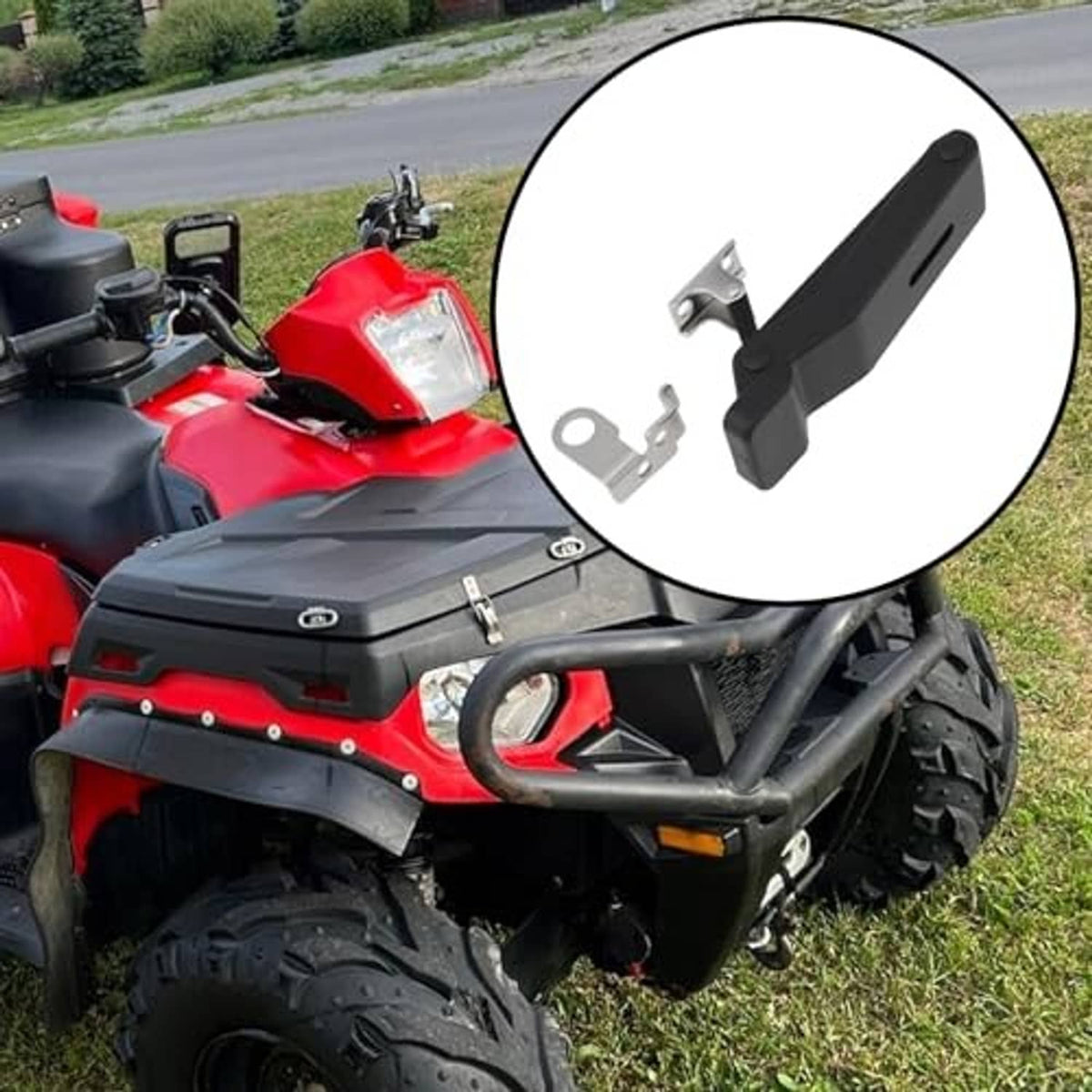 Black rubber latch for ATV front storage rack with silver mounting clips, close-up