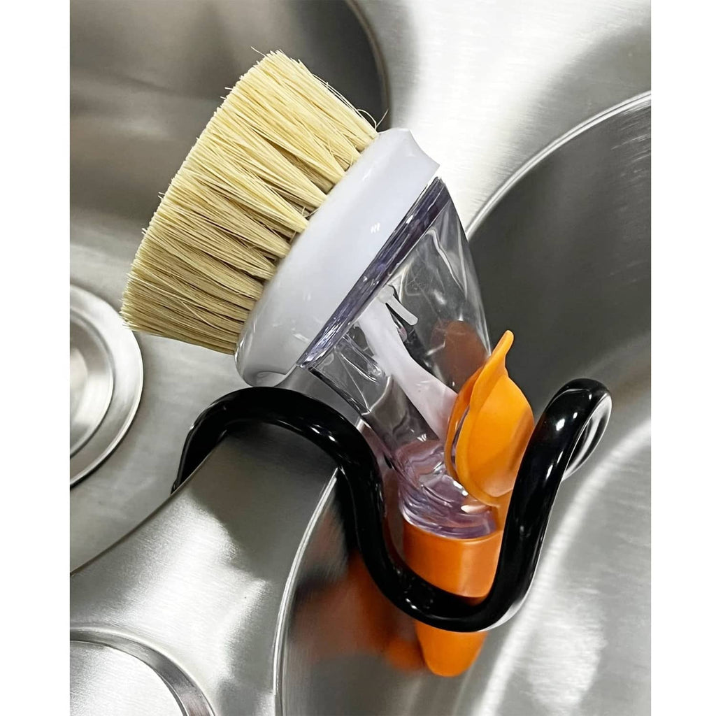 Adjustable dish wand holder with black rack, orange clips, and brush head attachment