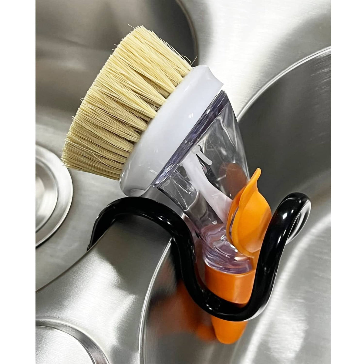 Adjustable dish wand holder with black rack, orange clips, and brush head attachment