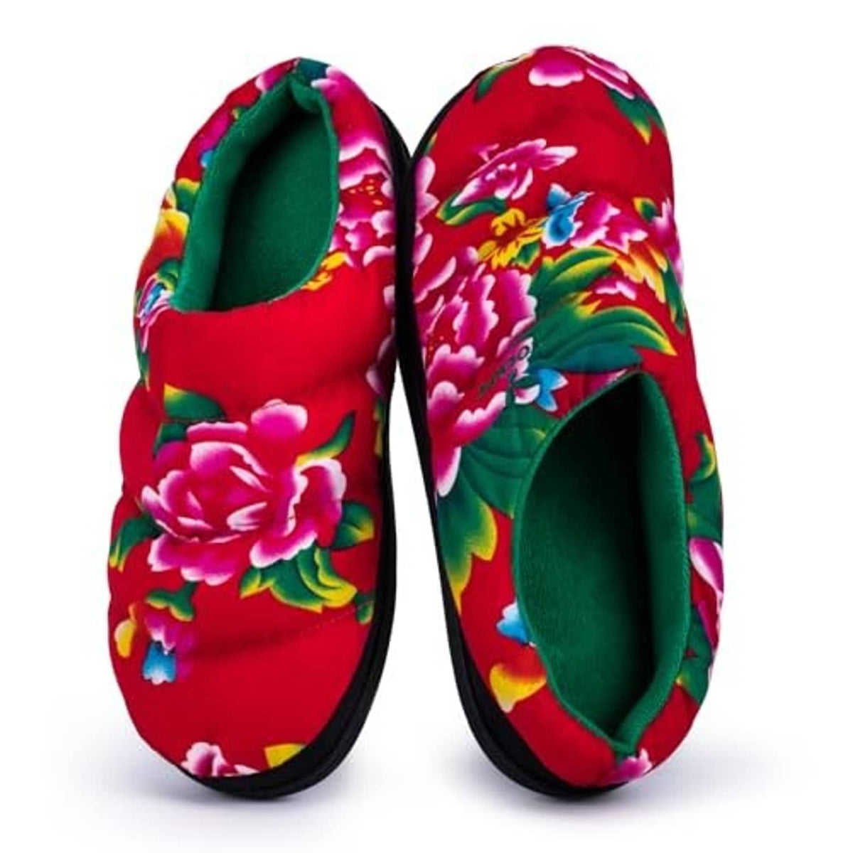 Floral slip-on slippers in red and green with bright blossoms, open heel, black sole.
