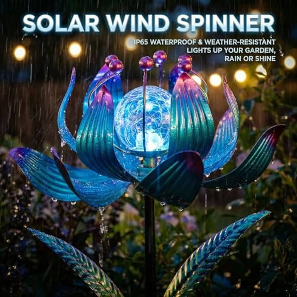 Solar wind spinner lotus with blue RGB glow, crackle-glass globe, and solar panel base at night