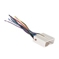 Aftermarket car radio wiring harness with multicolored wires and plug connector