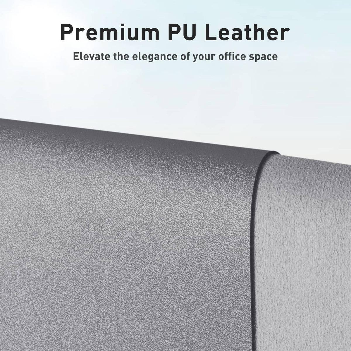 Light grey PU leather desk pad protector with textured grain and curved edge