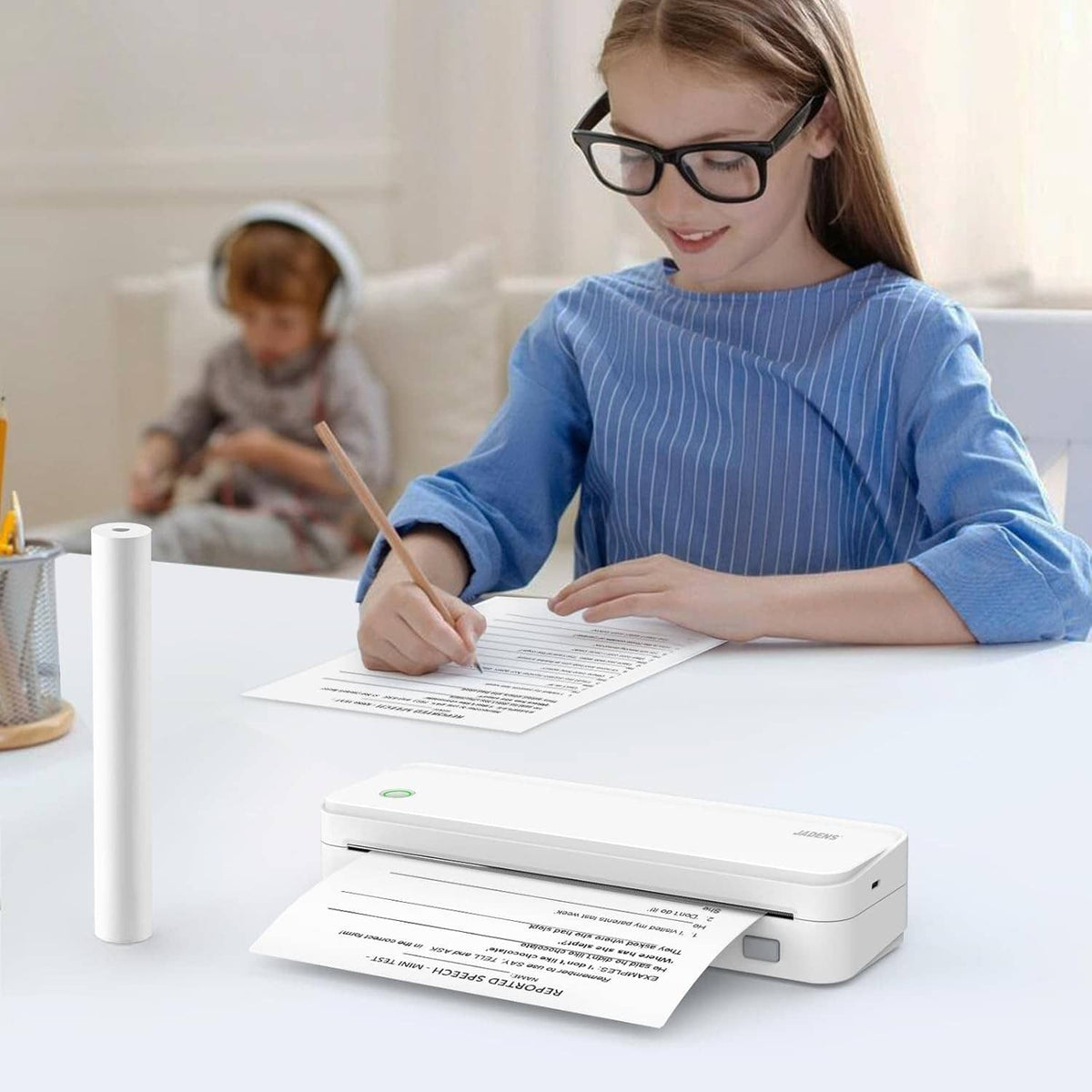 Thermal printer with rolled paper and child writing on printed receipt
