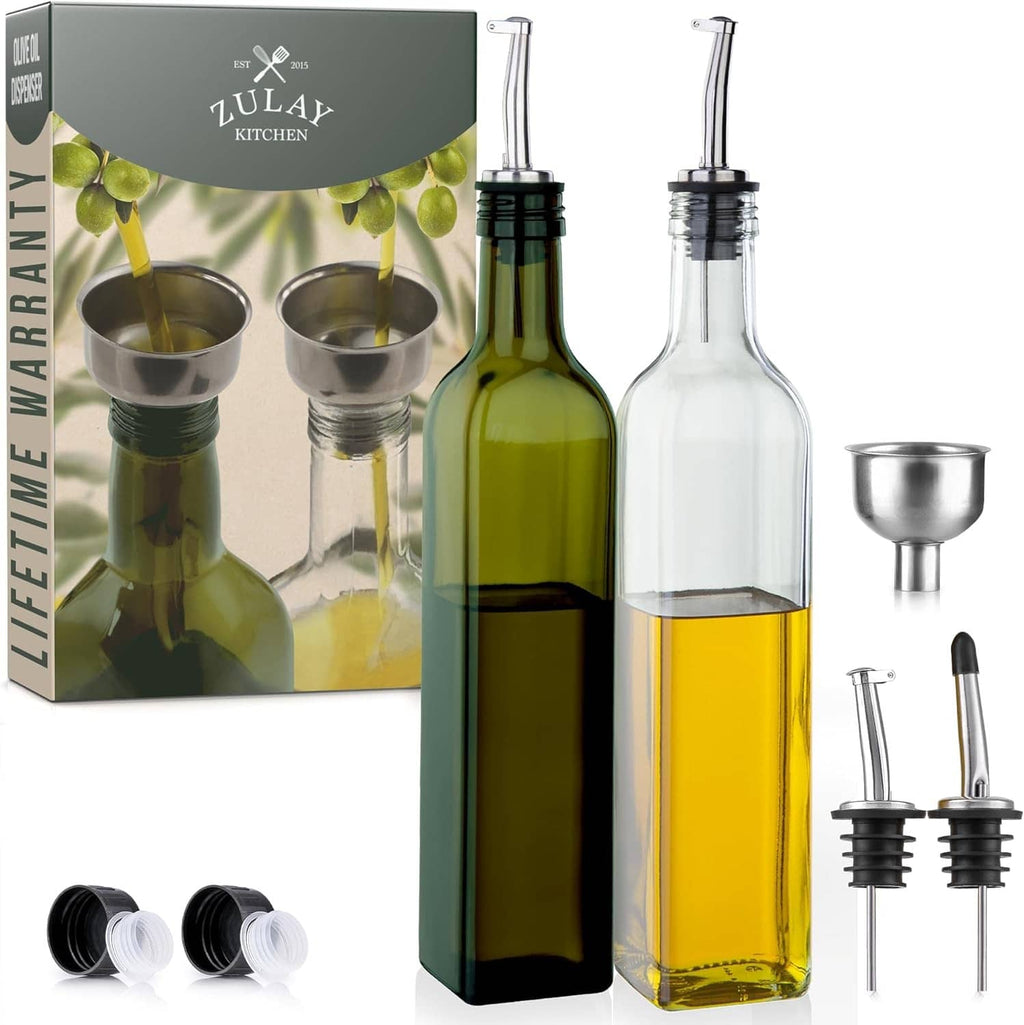 Set of two glass olive oil dispensers with flip-cap spouts, clear and green bottles
