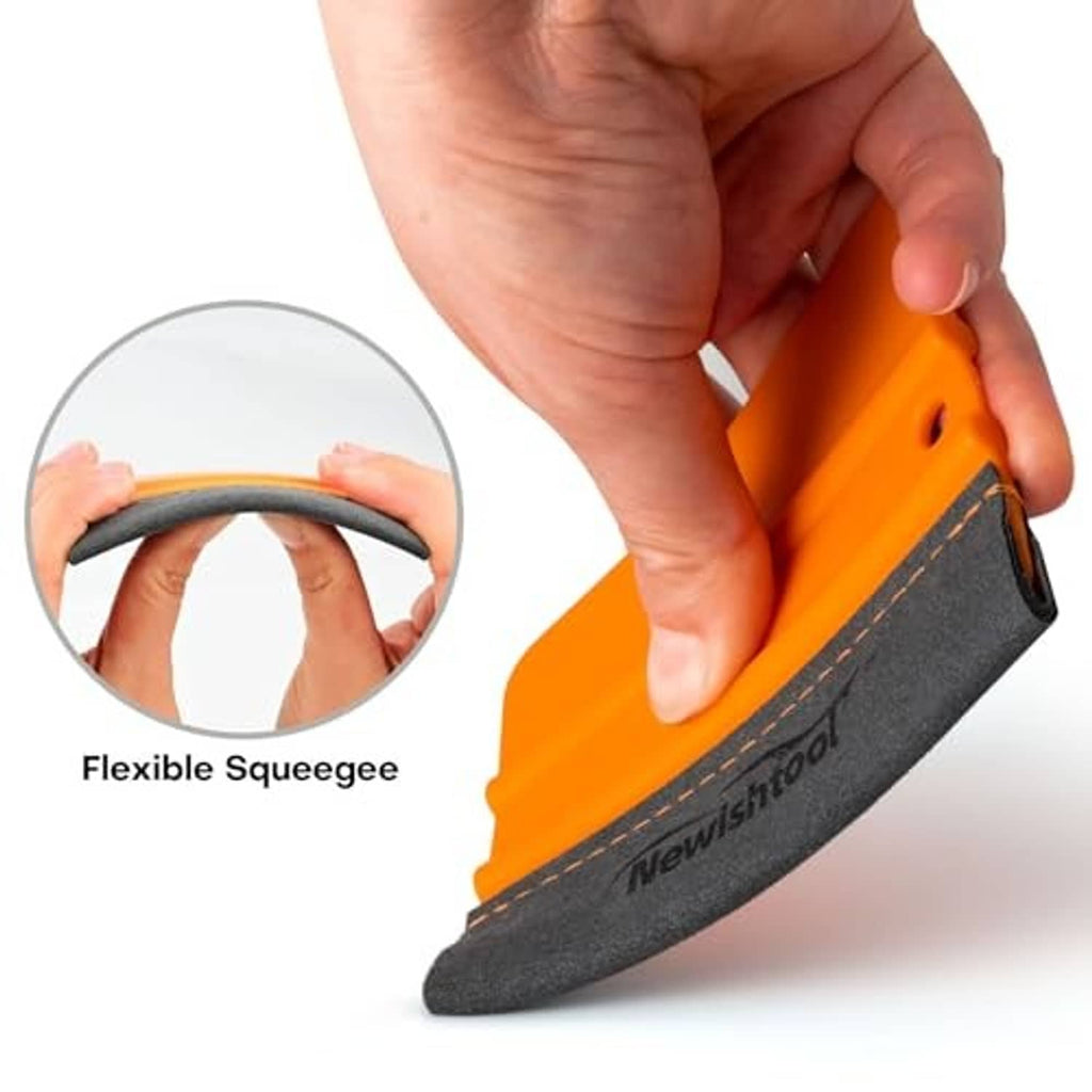 Flexible orange vinyl wrap squeegee with gray felt buffer edge held by hand