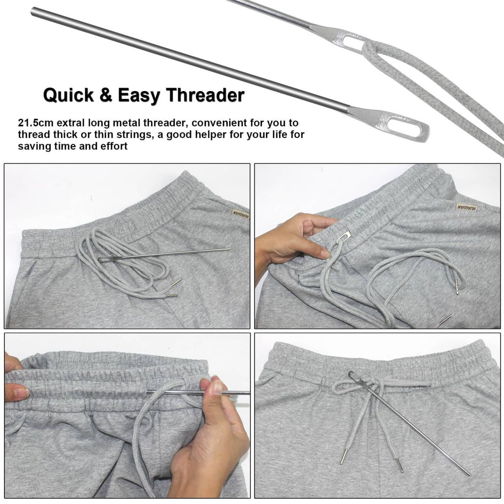 Gray sweatpants waistband with threaded drawstring cords and metal needle