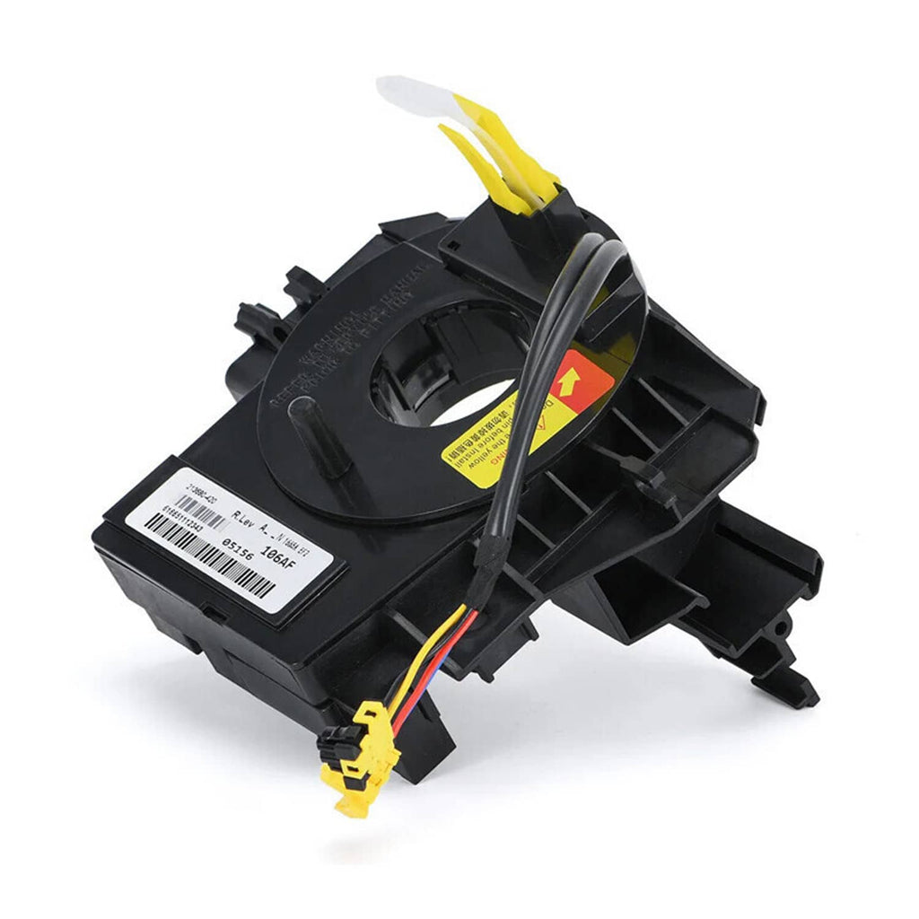 Clock spring with yellow warning label and mounted yellow connector plugs