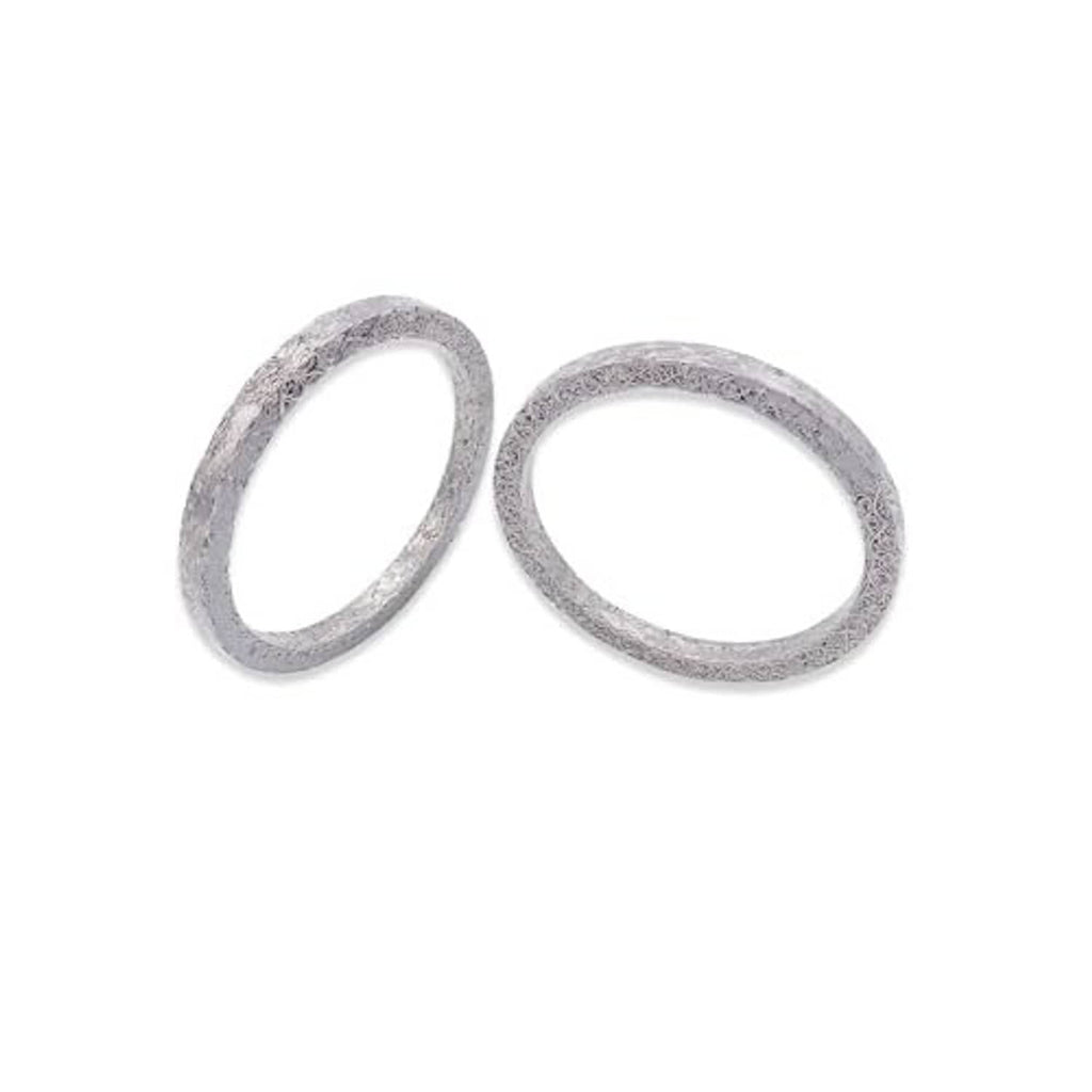 Exhaust port gasket kit with two textured gray steel mesh rings