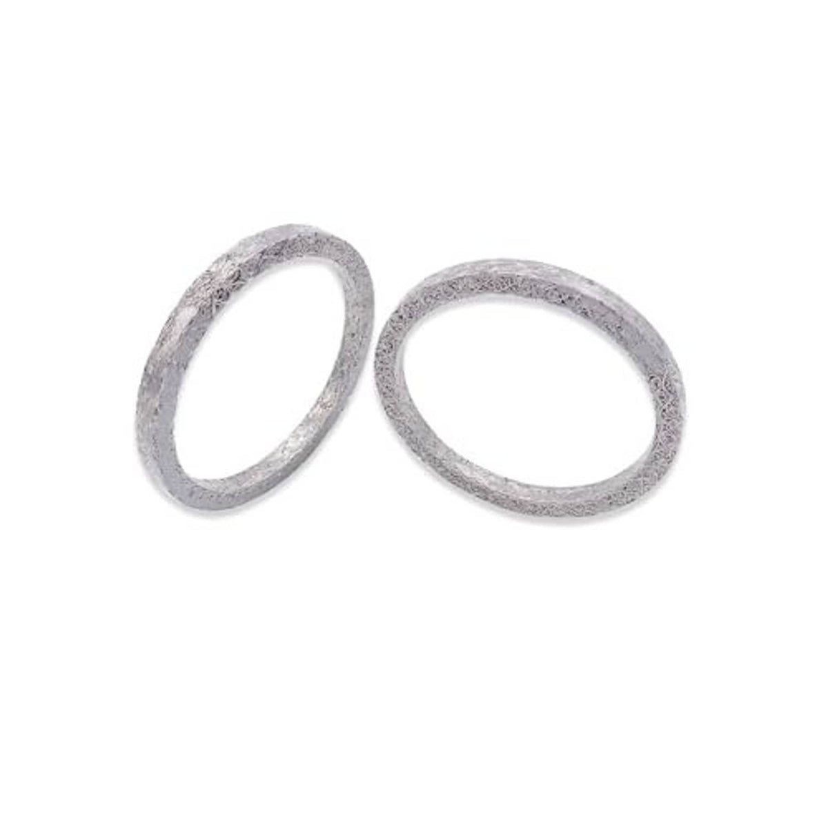 Exhaust port gasket kit with two textured gray steel mesh rings