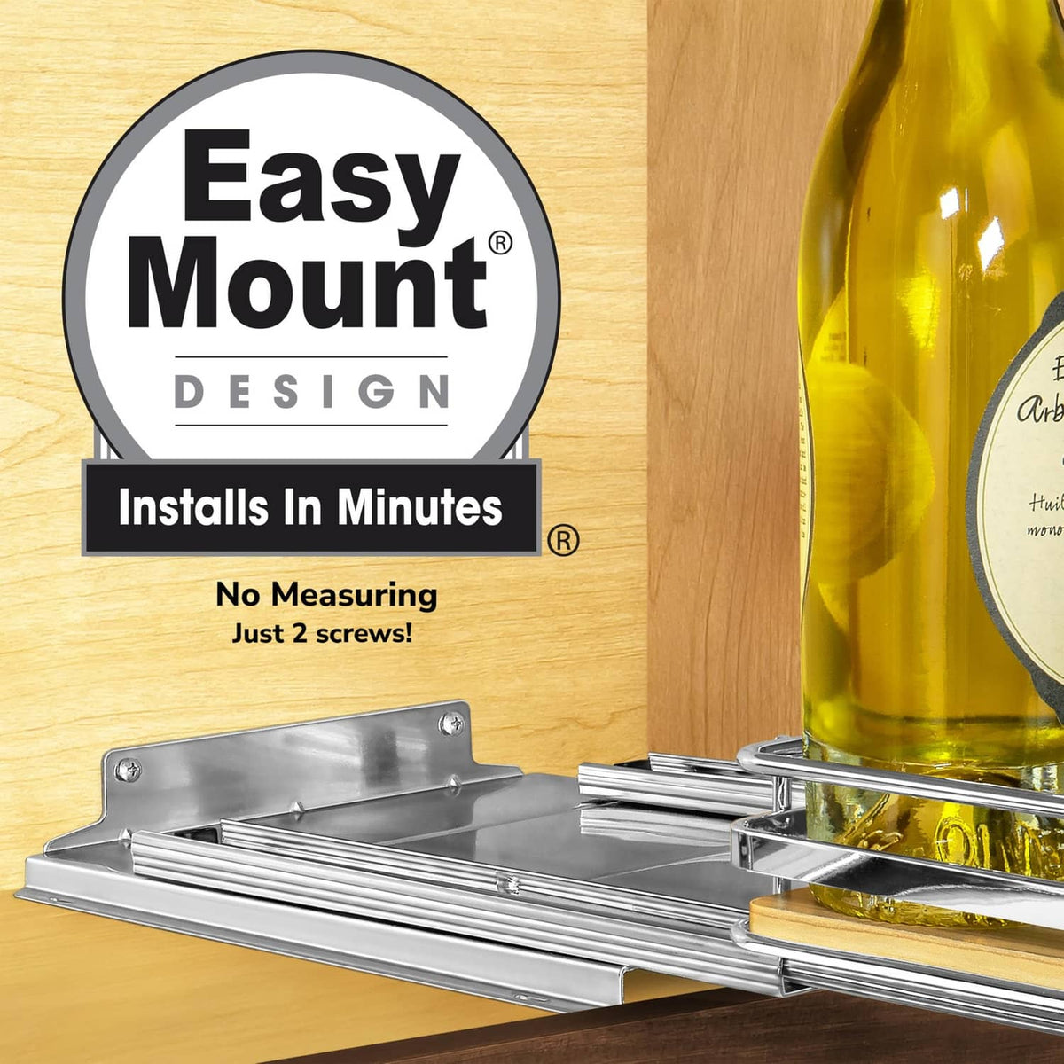 Pull-out spice rack with chrome rails and wood tray, holding a glass bottle