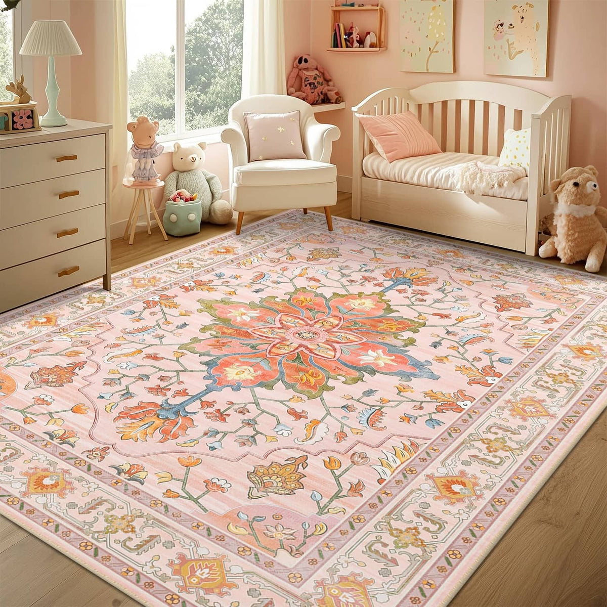 Pink and light pink floral rectangular area rug with central medallion border