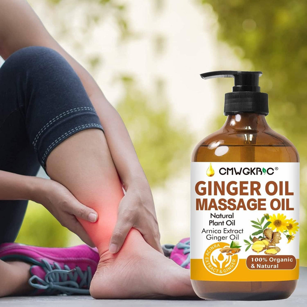 Amber ginger oil massage bottle with black pump beside leg held for comfort.