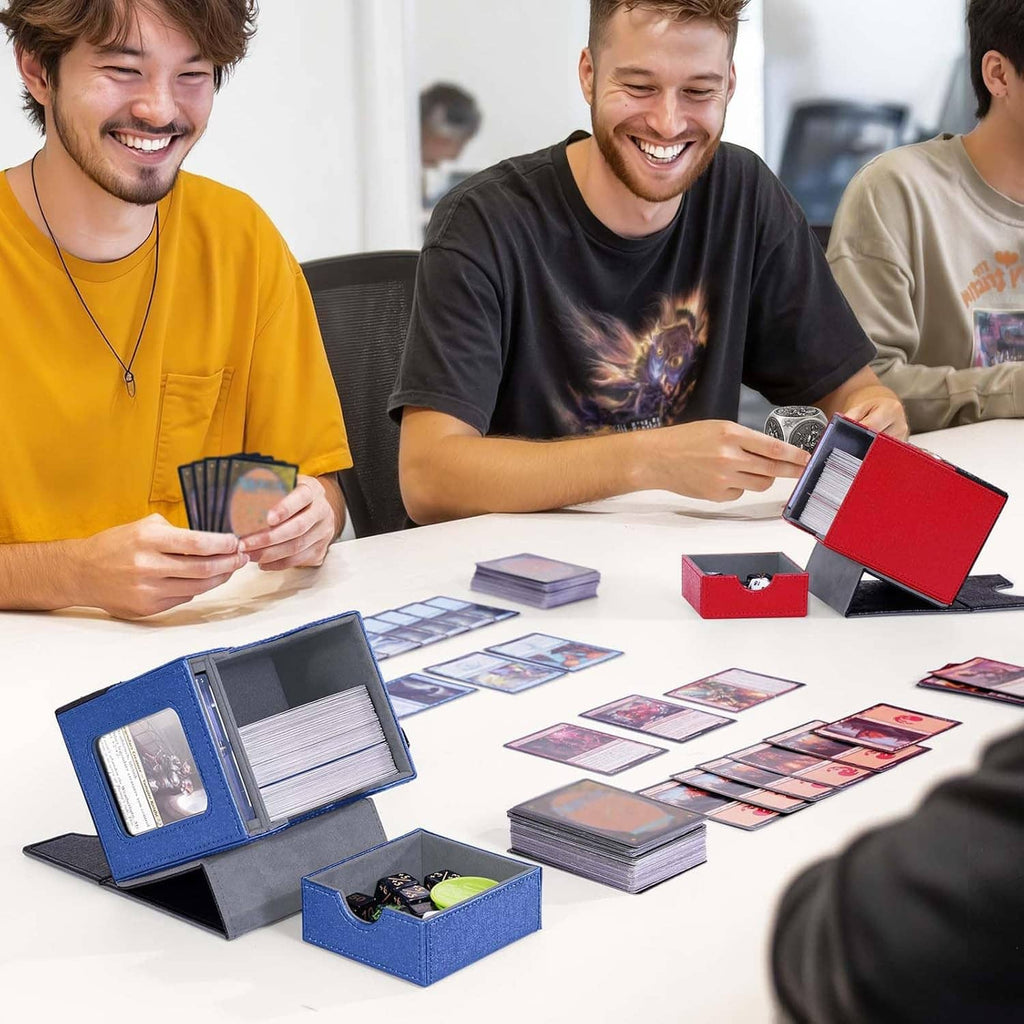 Deck box on gaming table with cards spread and open blue-and-black lid