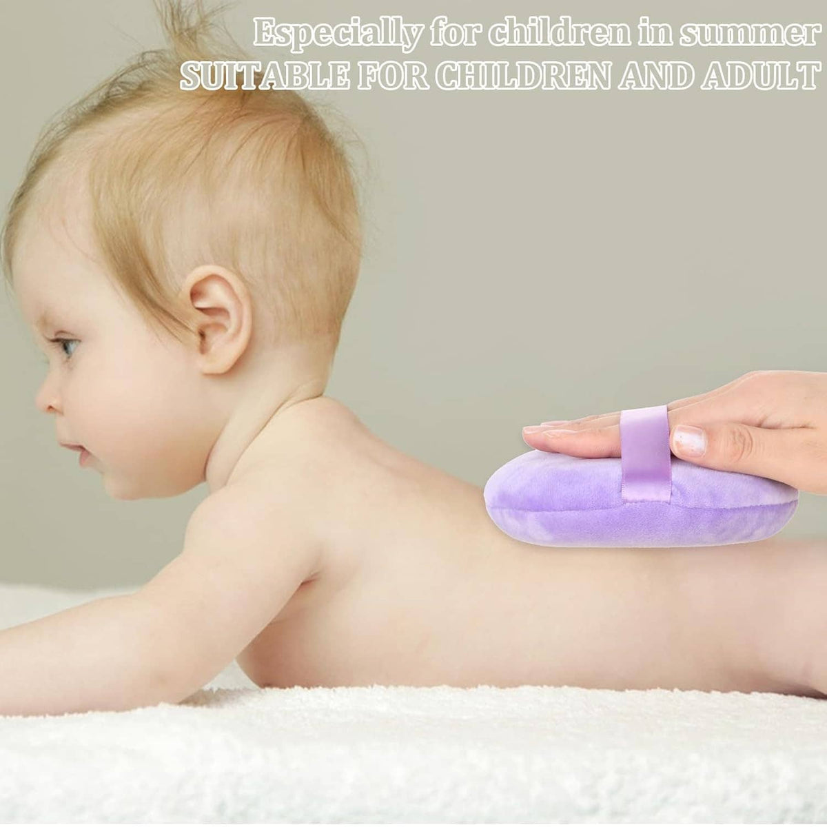 Lavender round velour body puff with light-lavender center strap near child’s shoulder