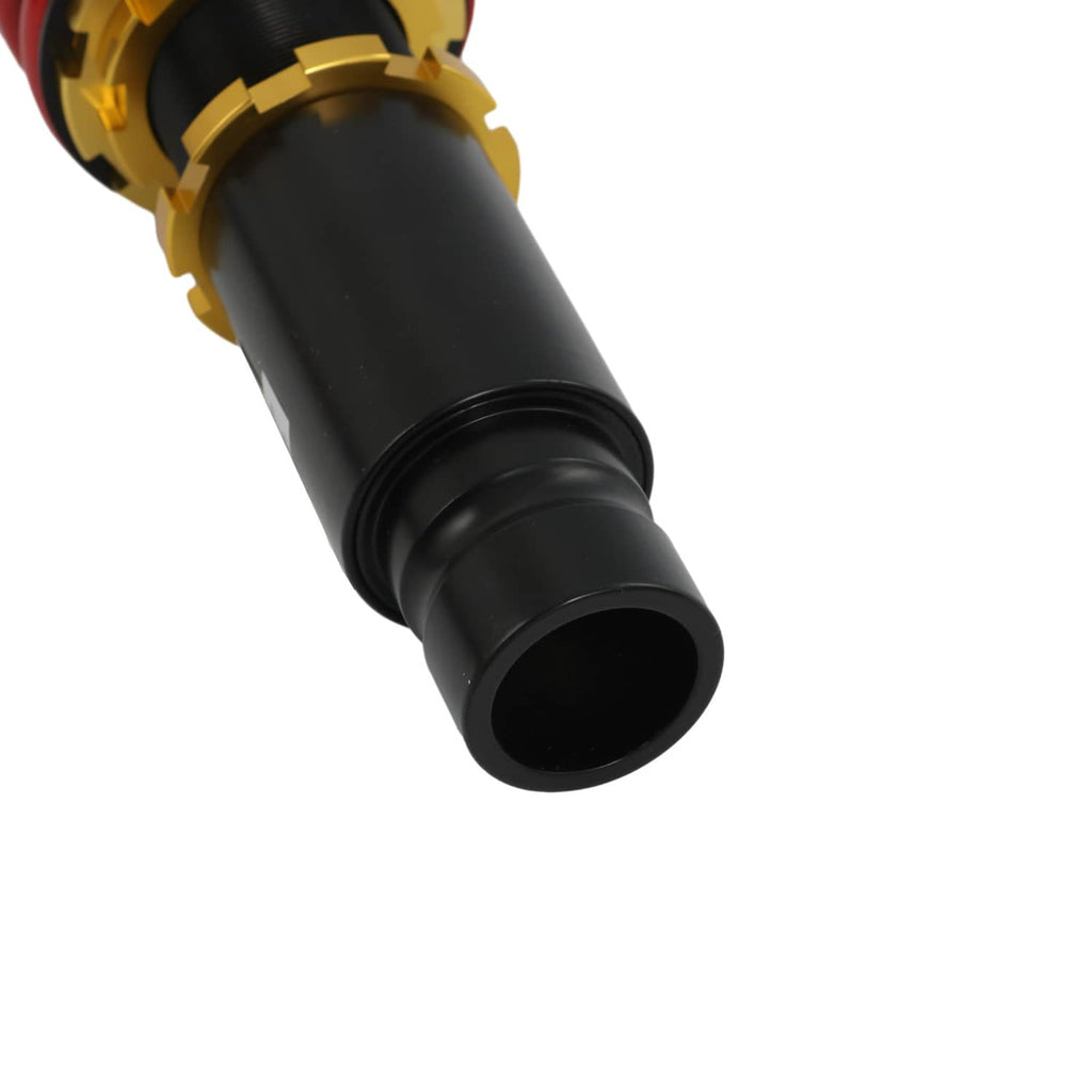 Black shock body end with gold mounting collar and red spring section