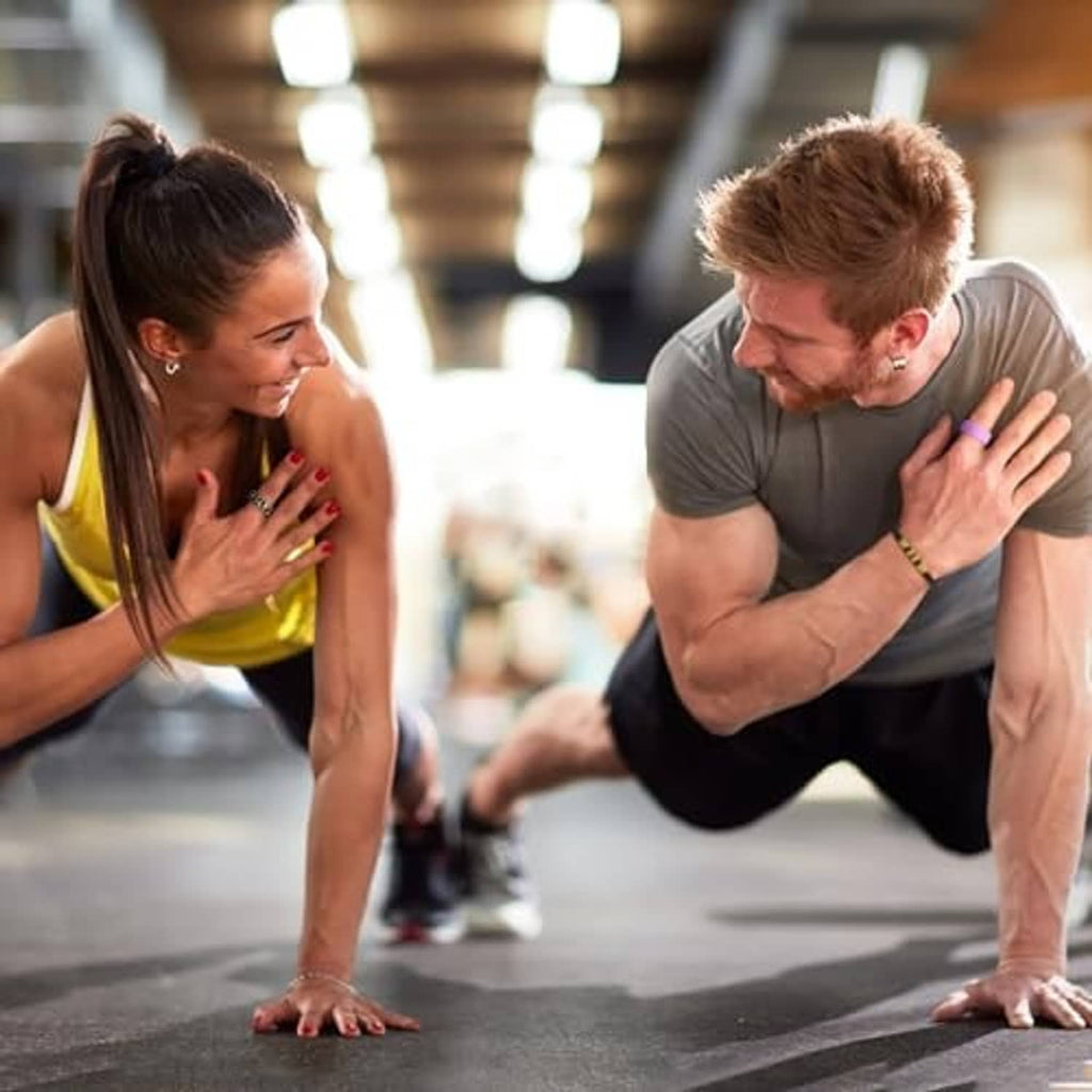 Ring covers not clearly visible; two people exercising