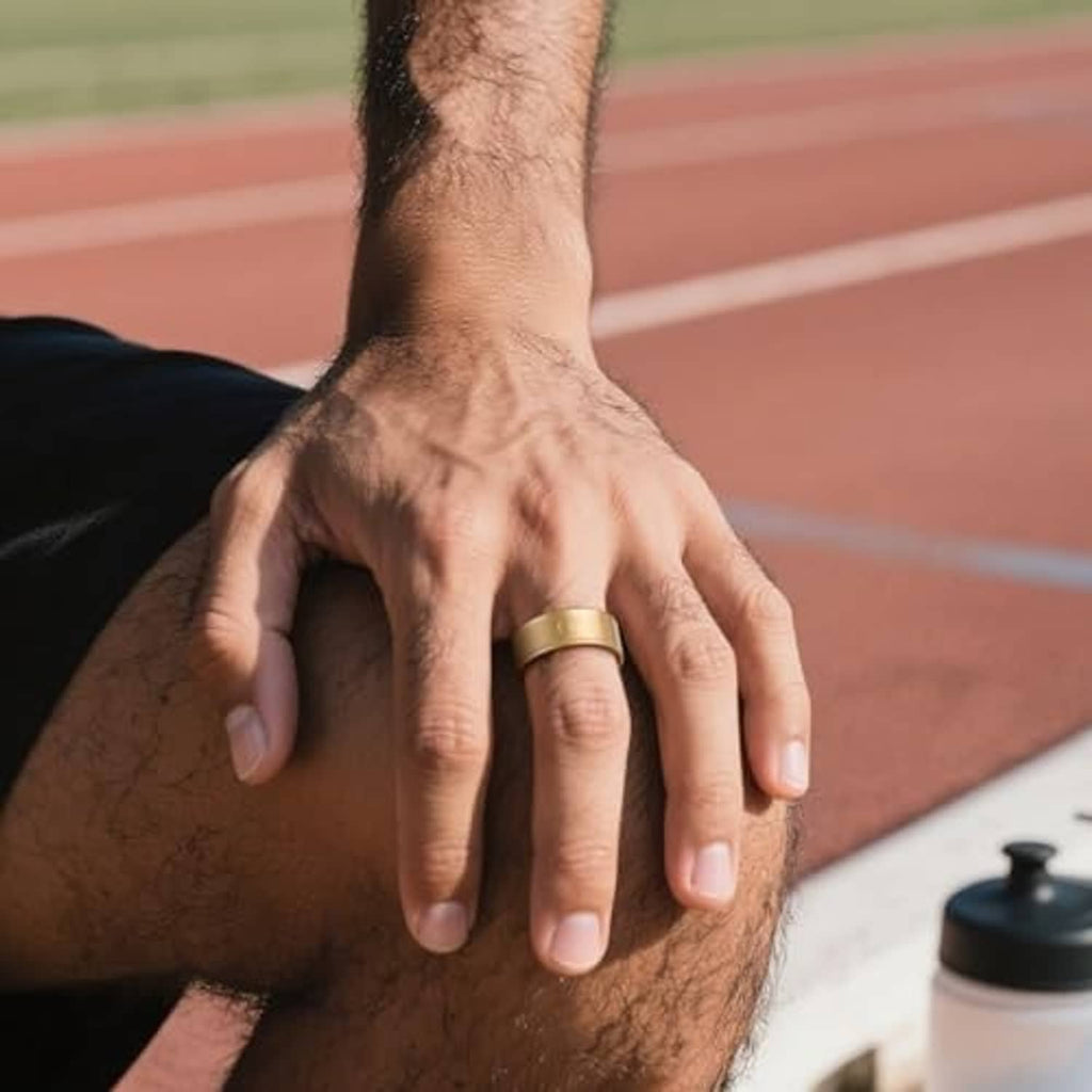 Gold TPU ring cover worn on a man’s finger