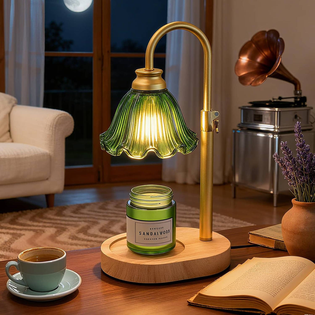 Green flower-style glass candle warmer lamp with brass curved stand and wooden base