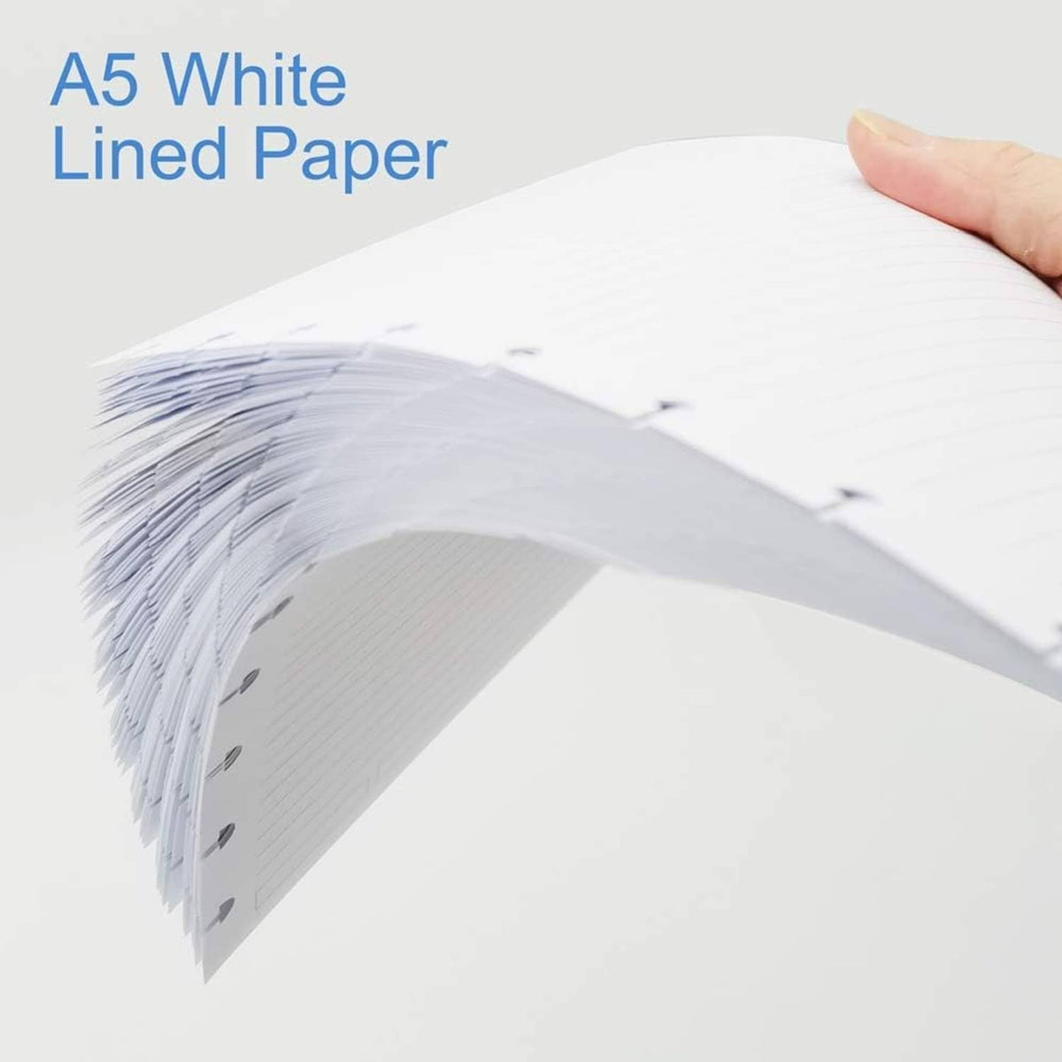 White A5 lined refill paper fan with visible edge disc holes