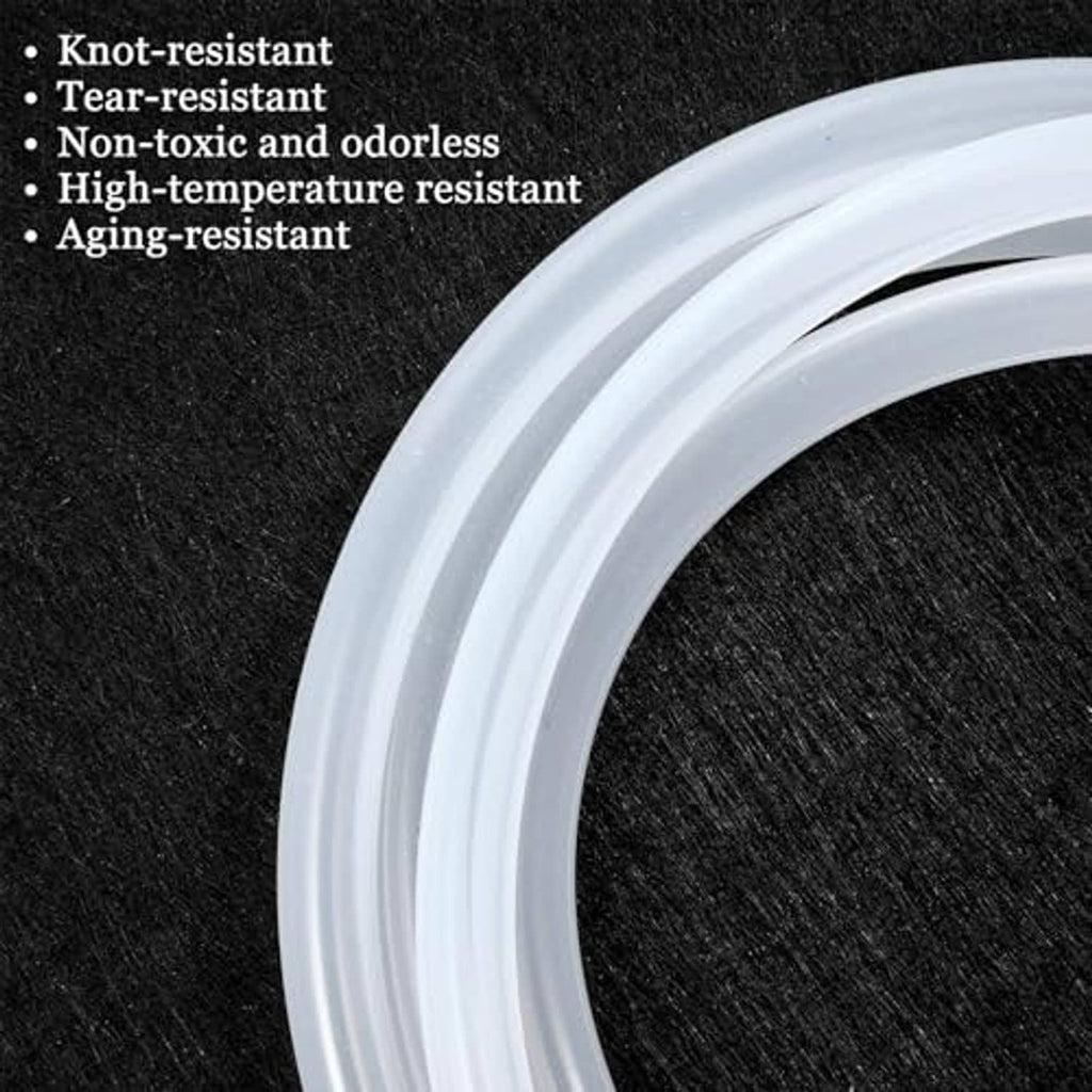 Coiled transparent silicone tubing close-up, uniform light-gray wall profile