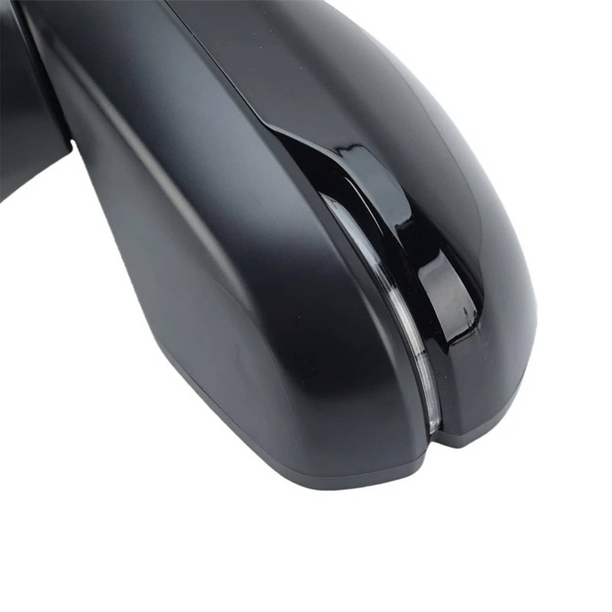 Side mirror housing close-up with integrated trim and reflective black finish