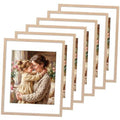 Natural wood-tone picture frame set of 6, with white inner border