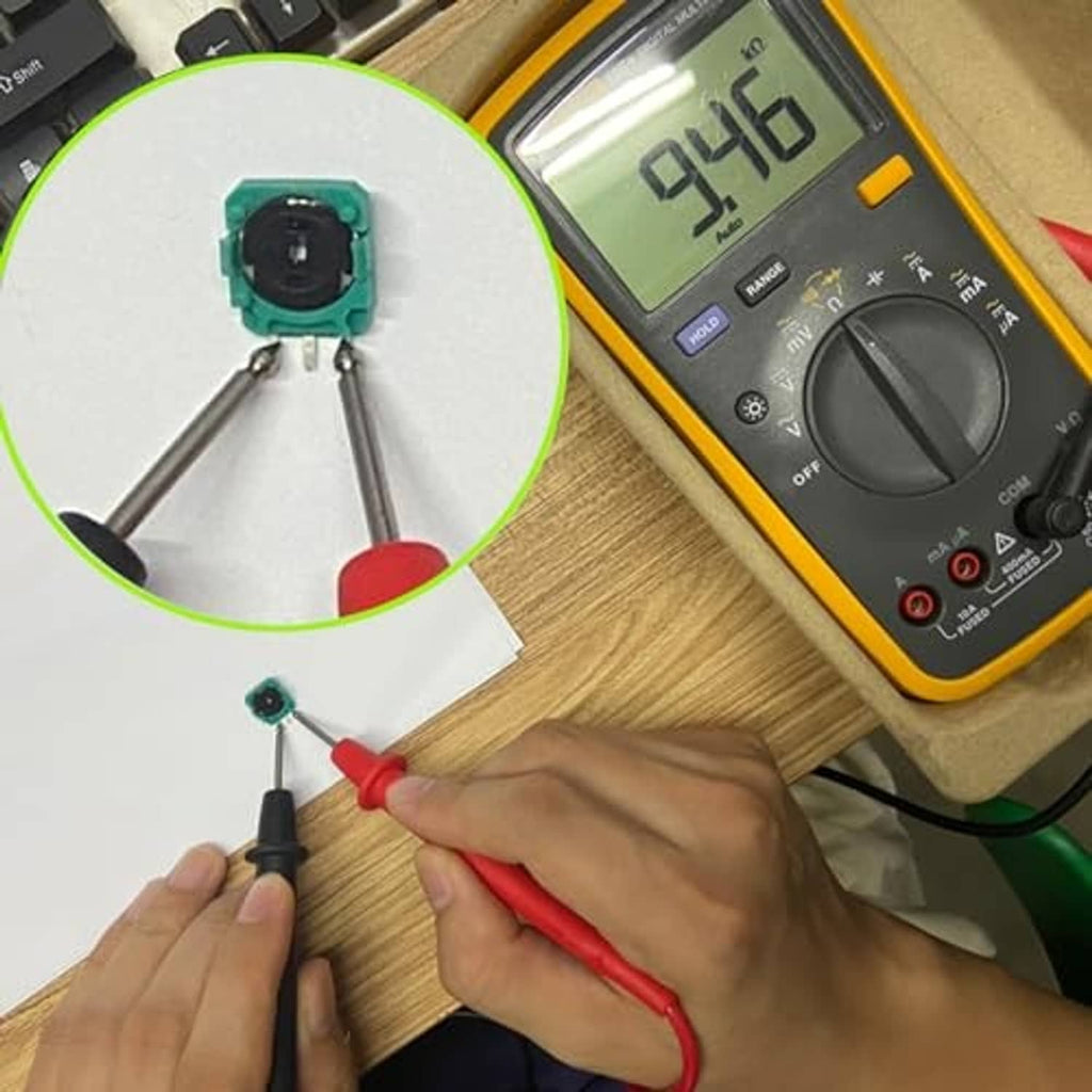 Hand tools soldering a teal 3-pin trimmer potentiometer onto a circuit board