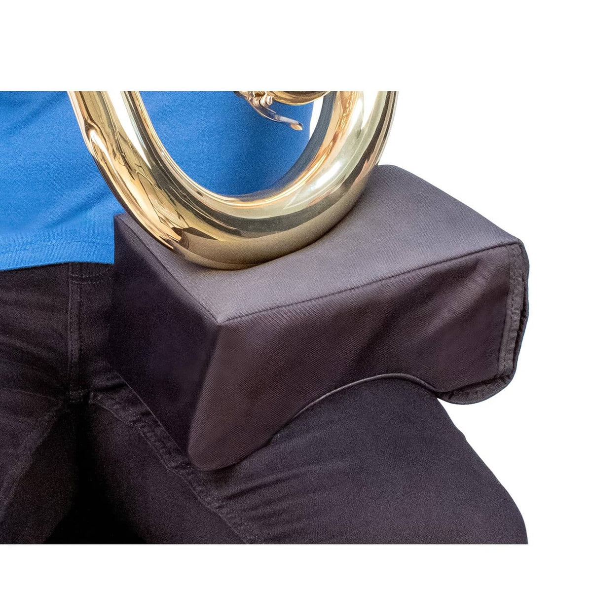 Black ergonomic lap pad fitted under instrument bell on padded contact surface