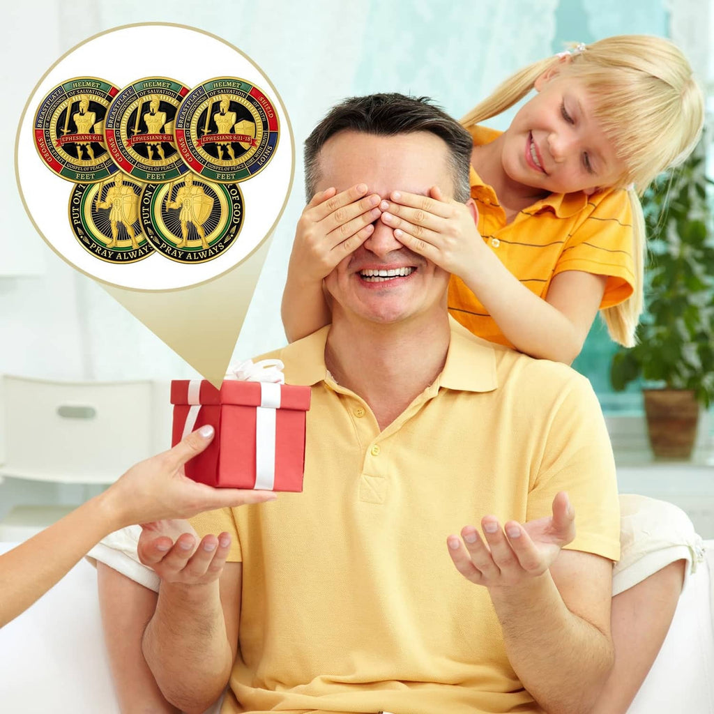 Gold-tone prayer coin with helmet emblem shown with a gift and smiling people