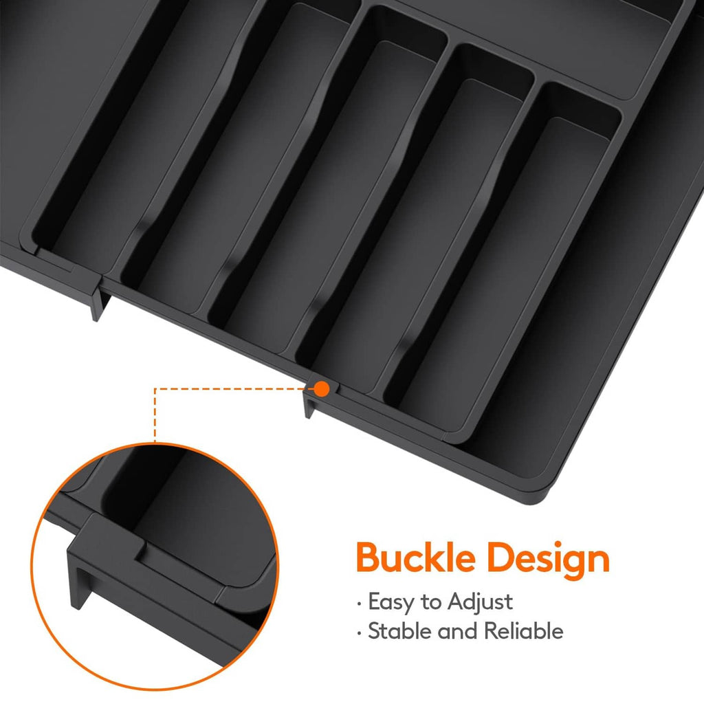 Dark expandable utensil tray with buckle-style adjustment latch on the side