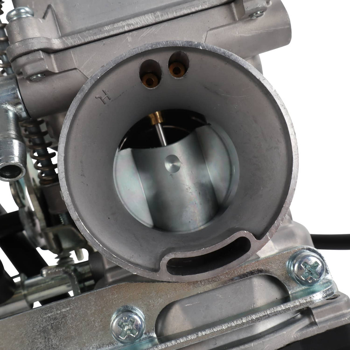 Close-up of carburetor intake bore with throttle area inside metal housing