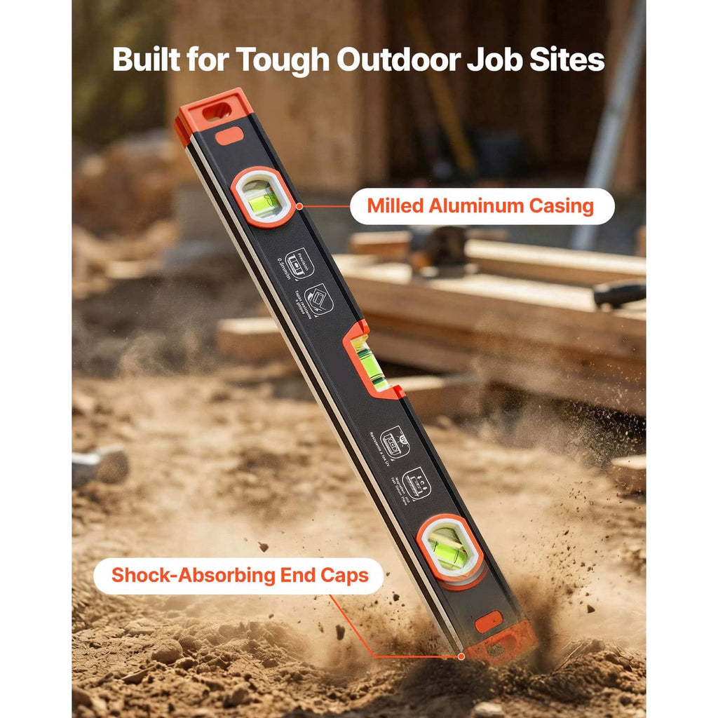 Black and orange torpedo level with milled aluminum casing and shock ends