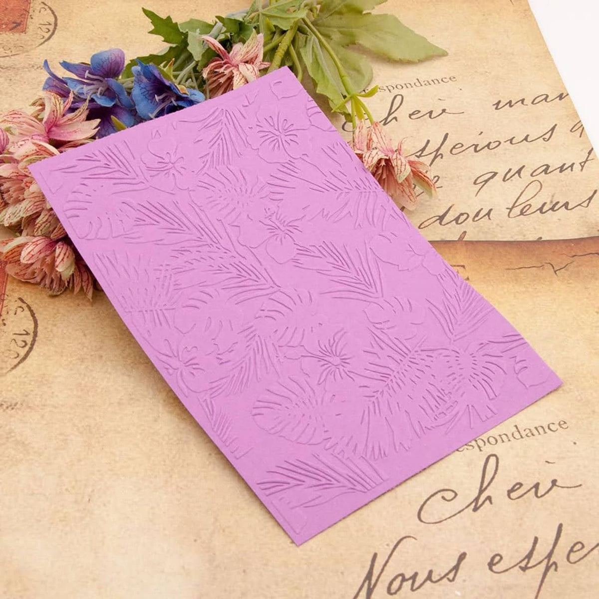 Purple plastic 3D embossing folder with hibiscus and tropical leaf floral pattern