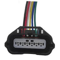 Plastic multi-pin wiring harness connector with color-coded lead wires