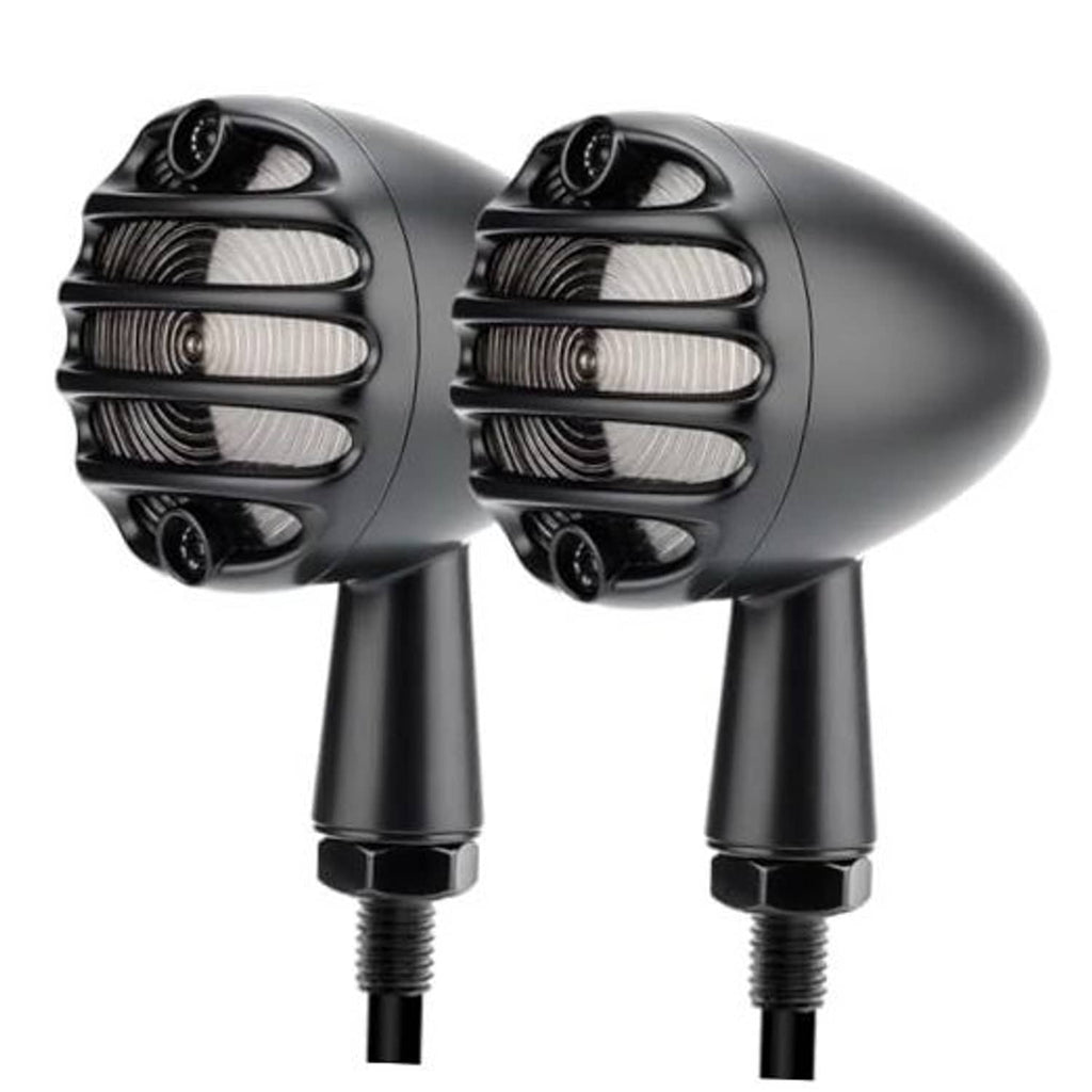 Two black motorcycle LED turn signal lights with ribbed grille and small front lenses