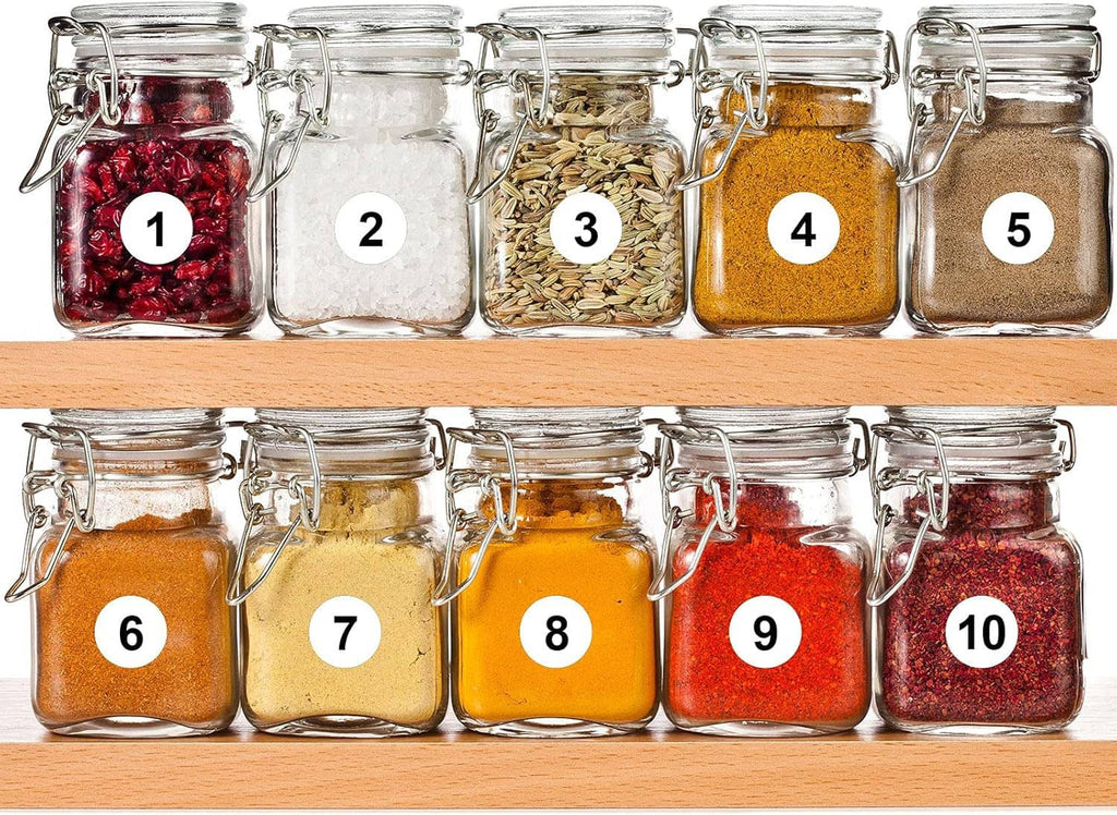 Vinyl number stickers applied to glass jars, white circles labeled 1 through 10