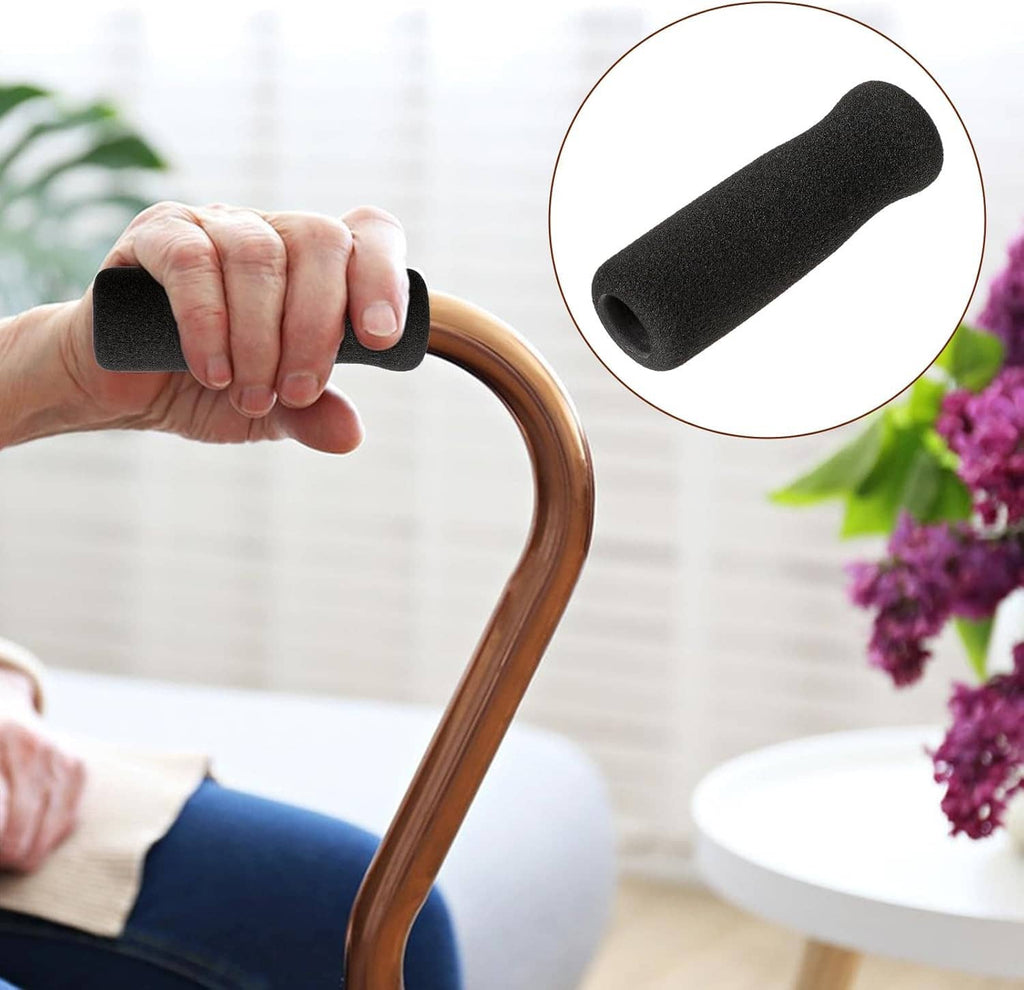 Black foam cane grip sleeve held in hand, cushioned replacement 4-pack