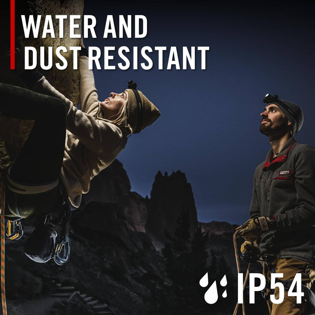 Black headlamp on person outdoors with water droplets in action