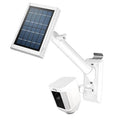 White solar spotlight camera with wall mount and solar panel, outdoor light fixture