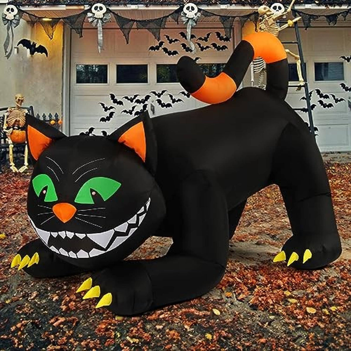 Inflatable black cat yard decoration set with orange ears and glowing green eyes