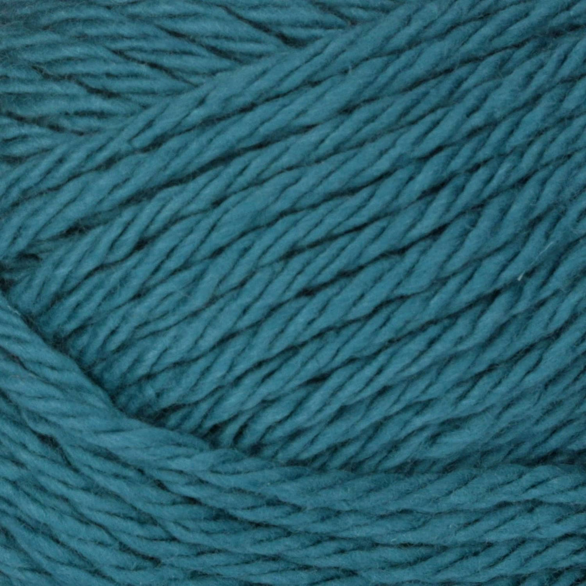 Close-up of teal-blue twisted yarn strands for easy crafting