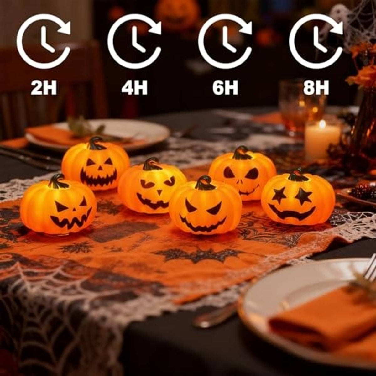 Halloween pumpkin tea lights glowing along a table runner with spiderweb decor