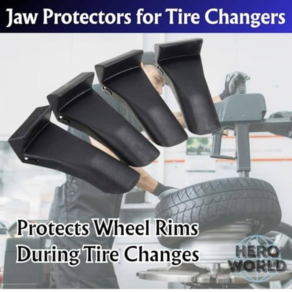 Black jaw protector covers on a tire changer tool for wheel rim protection