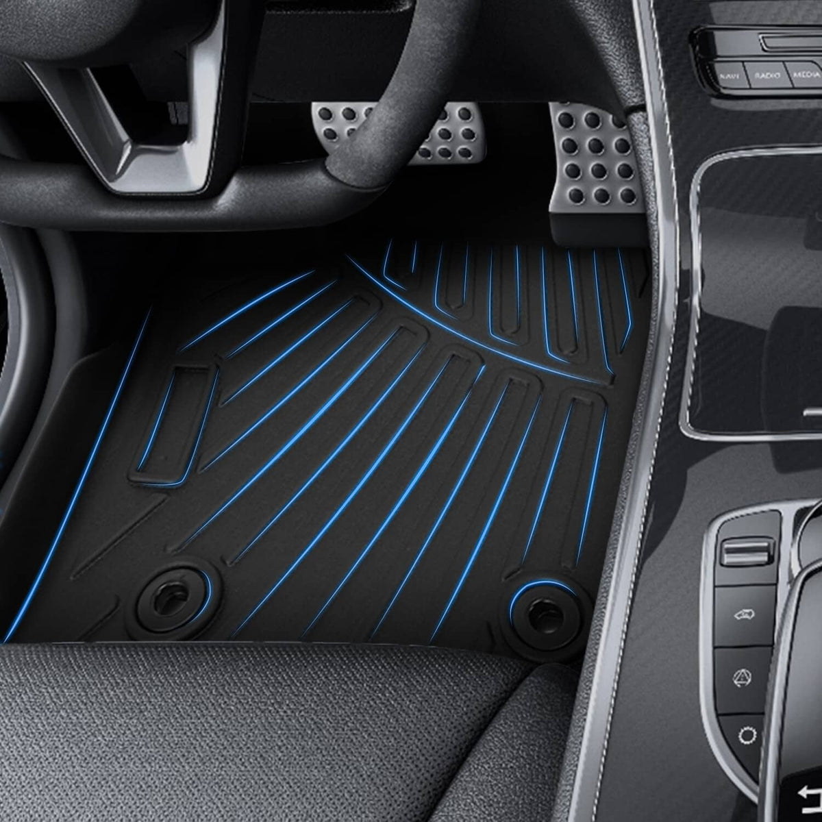 Black 3D TPE floor mat with ridged channels in the front driver-side footwell