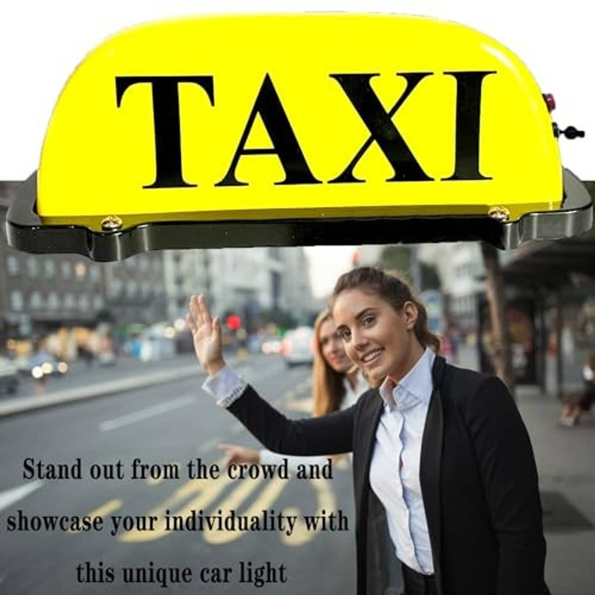 Yellow taxi roof light with bold black TAXI letters and black base