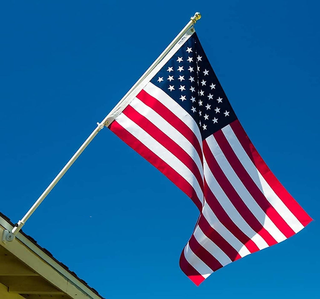 3x5 American flag waving on a pole, red and white stripes with blue star field